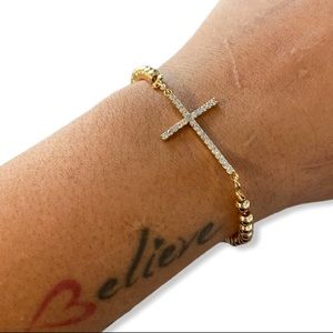 bracelet with the cross symbol 18K gold plated